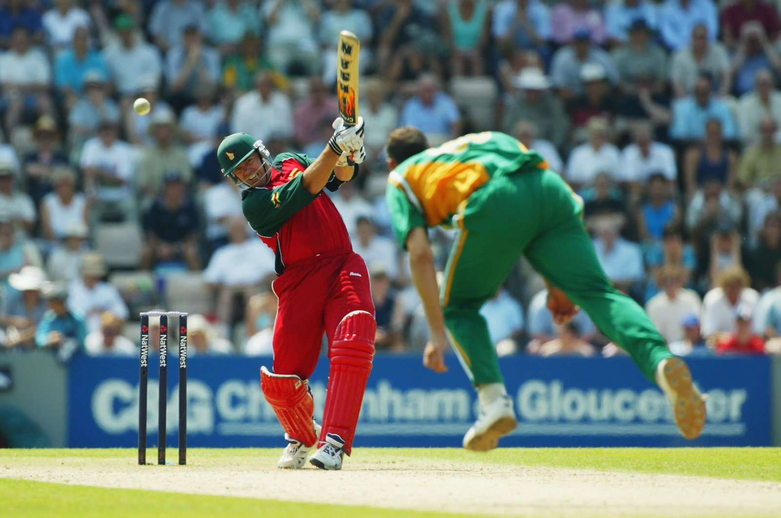Zimbabwe's Heath Streak hits out during the ninth match of the NatWest One Day Triangular Series between Zimbabwe and South Africa at The Rose Bowl Cricket Ground, Southampton, UK., July 10, 2003. (Getty Images Photo)