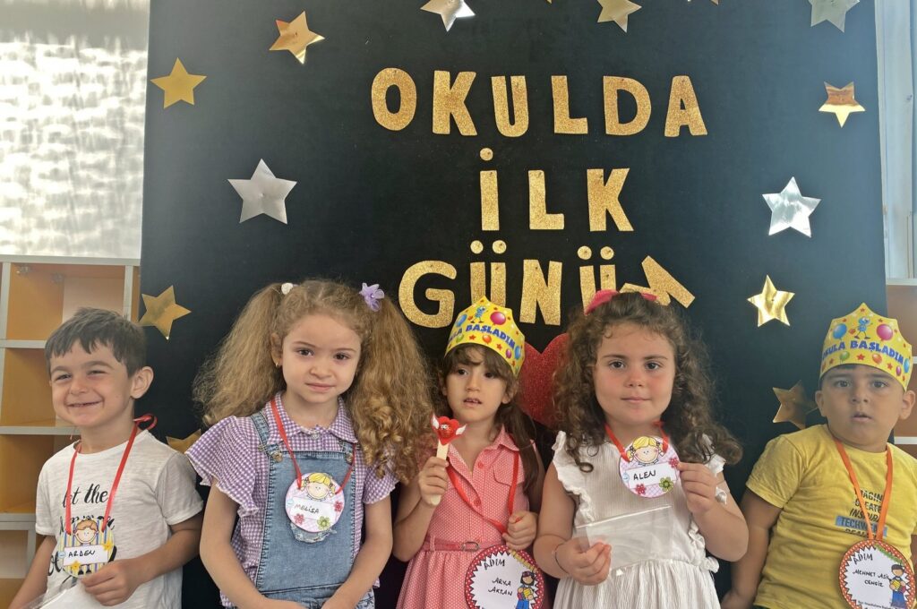Preschool students pose on their first day at school, Mersin, Türkiye, Sept. 4, 2023. (AA Photo)