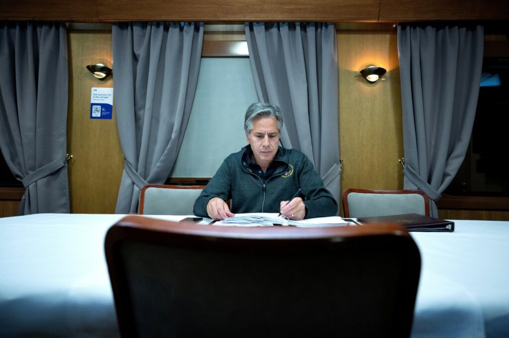 U.S. Secretary of State Antony Blinken works while traveling by train to Kyiv, Ukraine on September 6, 2023.     BRENDAN SMIALOWSKI/Pool via REUTERS