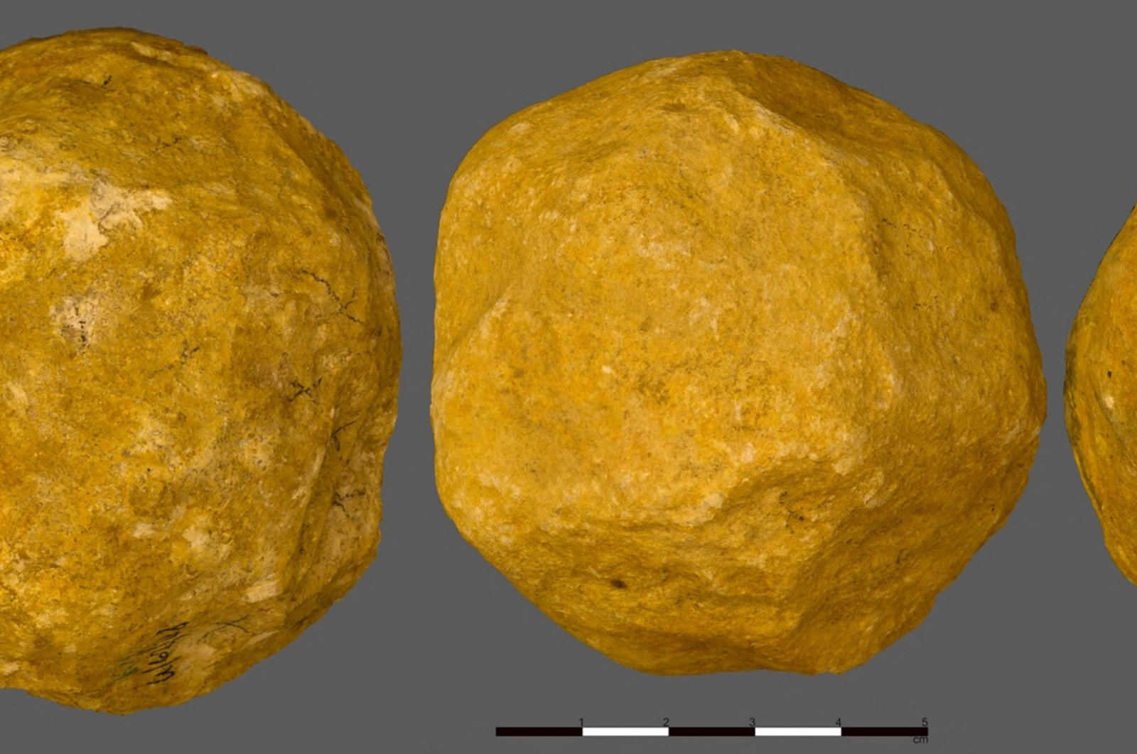 This handout image shows three limestone spheroids from the 'Ubeidiya Stone Age archaeological site in Israel, Sept. 6, 2023. (AFP Photo)