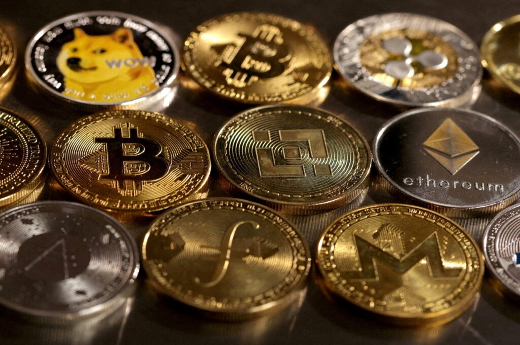 Representations of cryptocurrencies are seen in this illustration, Aug. 10, 2022. (Reuters Photo)