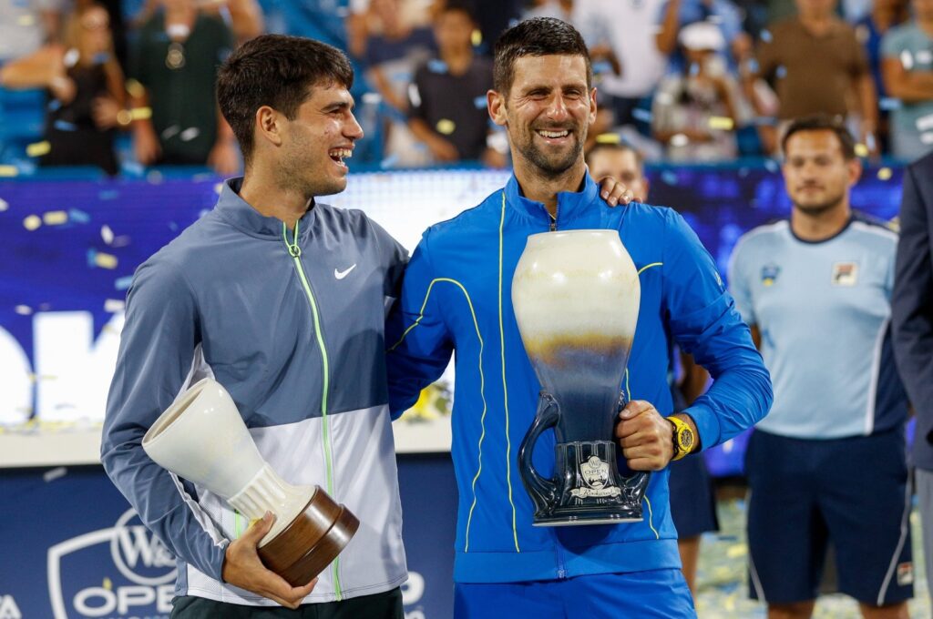 Spain's Carlos Alcaraz (L) stands with Serbia' Novak Djokovic after the final round at the Western & Southern Open at Lindner Family Tennis Center, Ohio, U.S., Aug. 20, 2023. (Getty Images Photo)