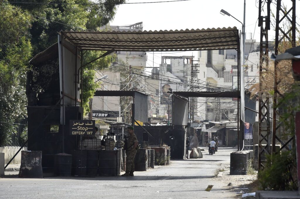 Lebanese army soldiers stand guard at the entrance of Ain el-Hilweh Palestinian refugee camp after clashes between supporters of the Fatah movement and rival groups erupted, in Sidon, Lebanon, Sept. 8, 2023. (EPA Photo)