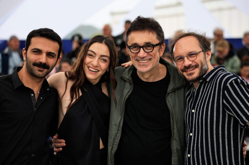 From L-R, Musab Ekici, Merve Dizdar, Nuri Bilge Ceylan and Deniz Celiloglu pose during a photocall for the film "About Dry Grasses" at the 76th edition of the Cannes Film Festival, Cannes, southern France, May 20, 2023. (AFP Photo)