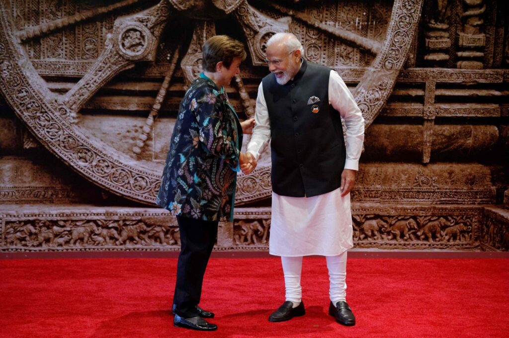 India's Prime Minister Narendra Modi (R) and International Monetary Fund (IMF) Managing Director Kristalina Georgieva shake hands ahead of the G-20 Leaders' Summit at the Bharat Mandapam in New Delhi, India, Sept. 9, 2023. (AFP Photo)
