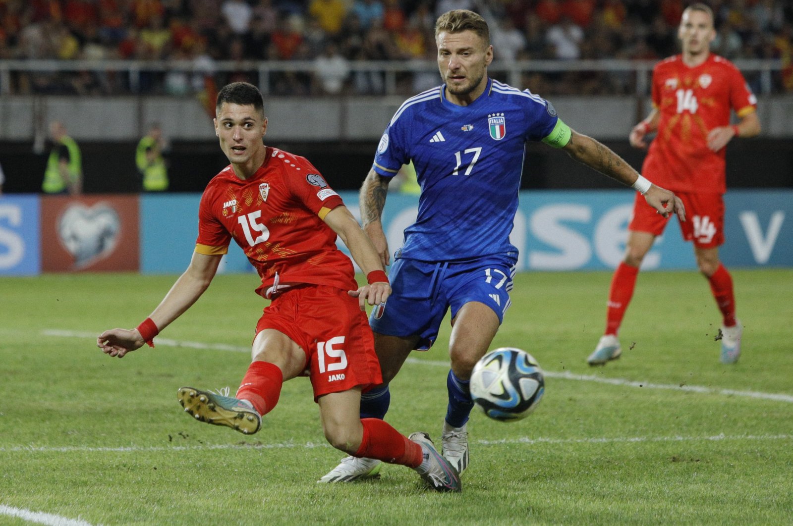 North Macedonia's Jovan Manev in action with Italy's Ciro Immobile during a Euro 2024 qualifier match, Skopje, North Macedonia, Sept. 9, 2023. (Reuters Photo)