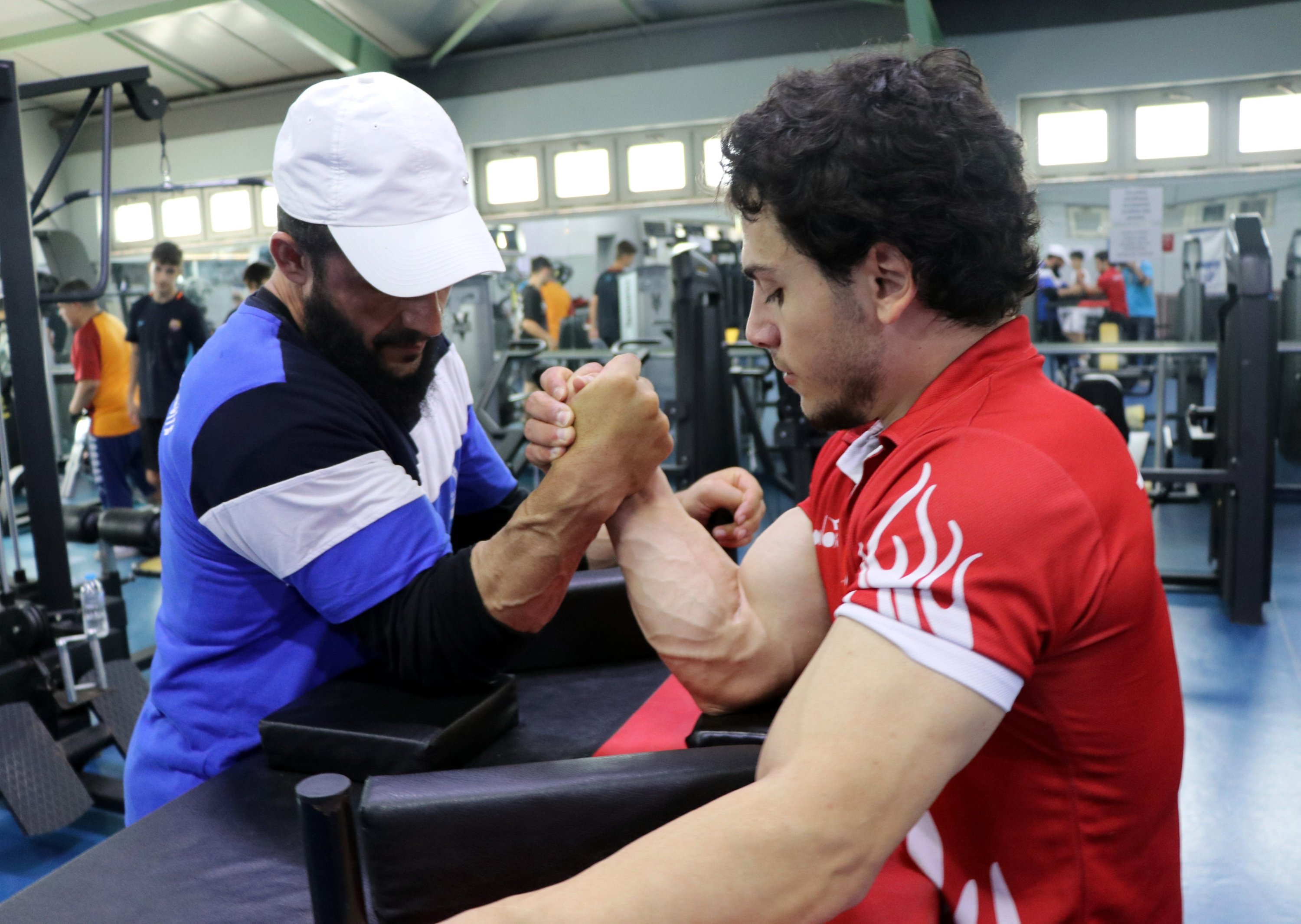 291583 Turkish para-arm wrestler Ismail Hacı Bekar (R) and his coach Kenan Eroğlu train at the Kağıtspor Club, Kocaeli, Türkiye, Sept. 10, 2023. (AA Photo)