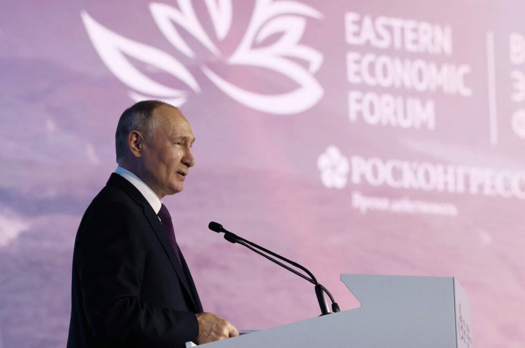 In this pool photograph distributed by Sputnik agency Russia's President Vladimir Putin addresses the audience during the Eastern Economic Forum in Vladivostok on Sept. 12, 2023. (AFP Photo)