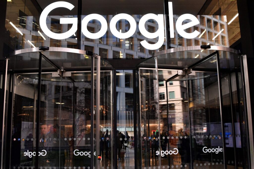 A logo is pictured above the entrance to the offices of Google in London on Jan. 18, 2019. (AFP File Photo)