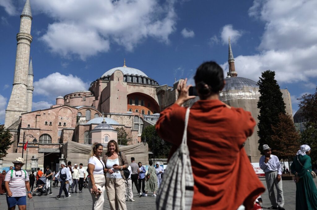 Tourists click pictures in front of the Hagia Sophia Grand Mosque in Istanbul, Türkiye, Sept. 16, 2023. (EPA Photo)