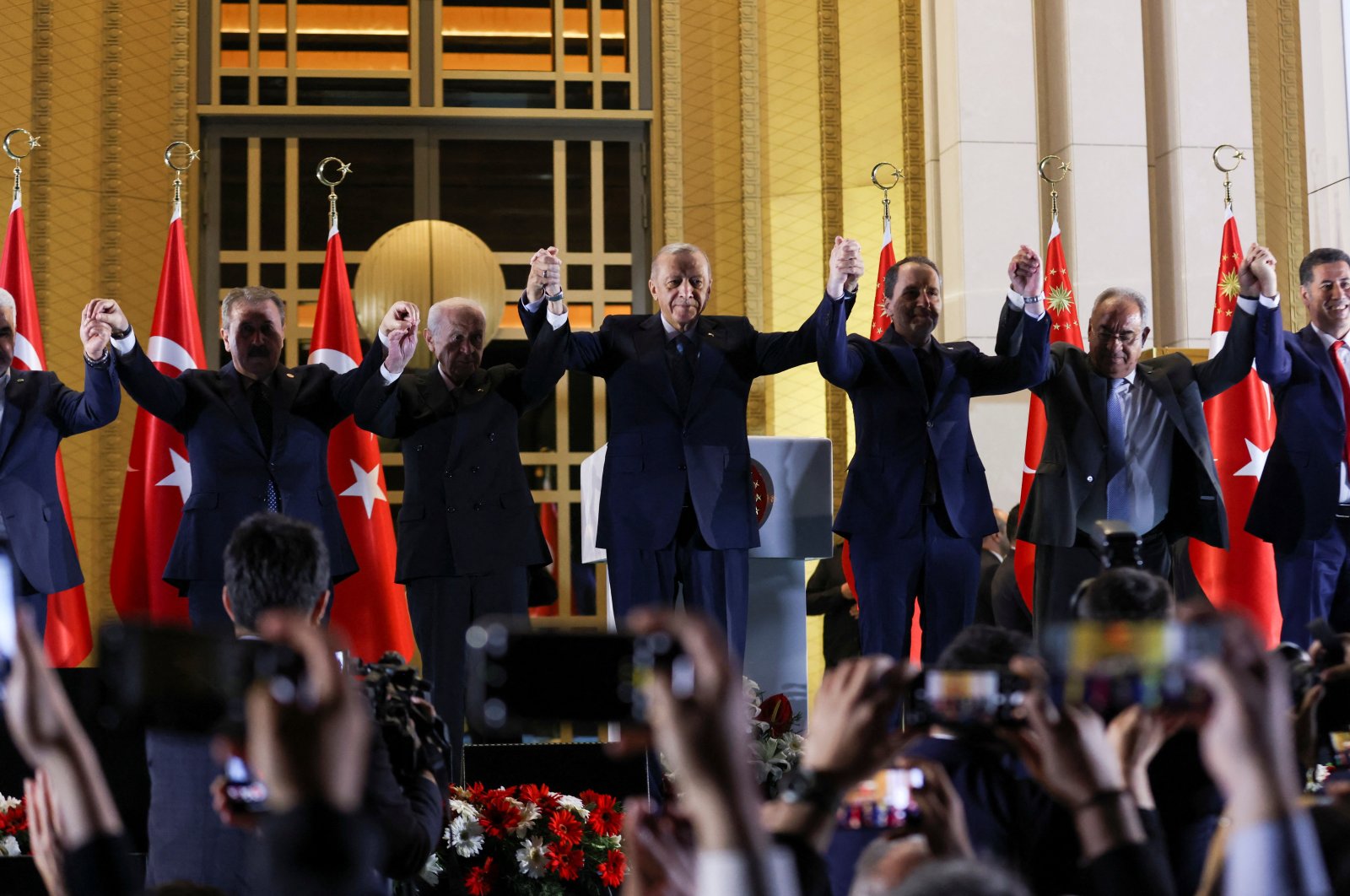 President Tayyip Erdoğan and his party's allies greet his supporters following his victory in the second round of the presidential election at the Presidential Palace in Ankara, Türkiye, May 29, 2023. (Reuters Photo)