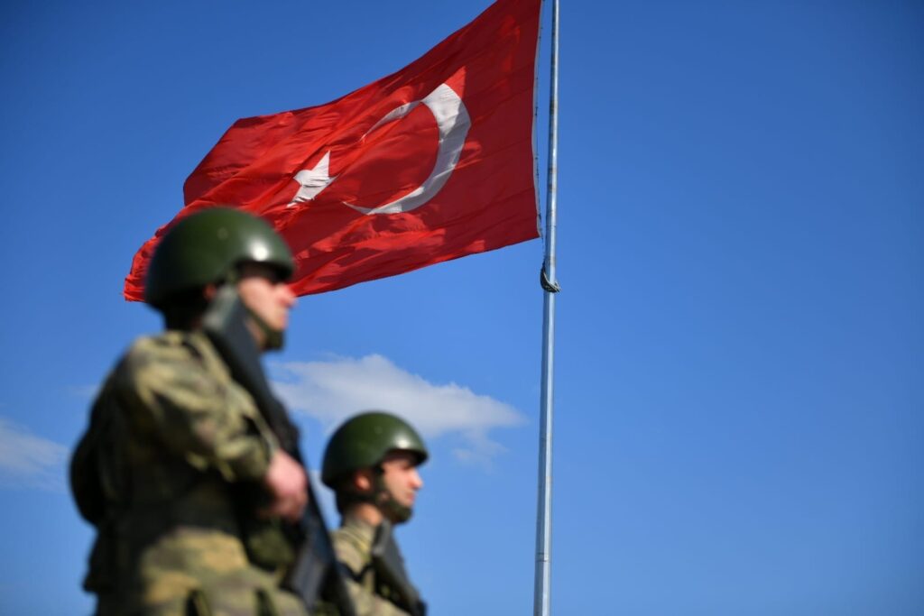 In this handout photo by the National Defense Ministry, Turkish soldiers watch over the border on an unnamed date. (DHA Photo)