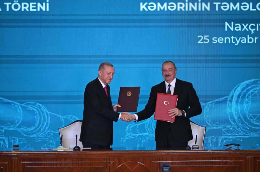 President Recep Tayyip Erdoğan shakes hands with Azerbaijani President Ilham Aliyev (R) during the ceremony in Nakchivan, Azerbaijan, Sept. 25, 2023. (AA Photo)