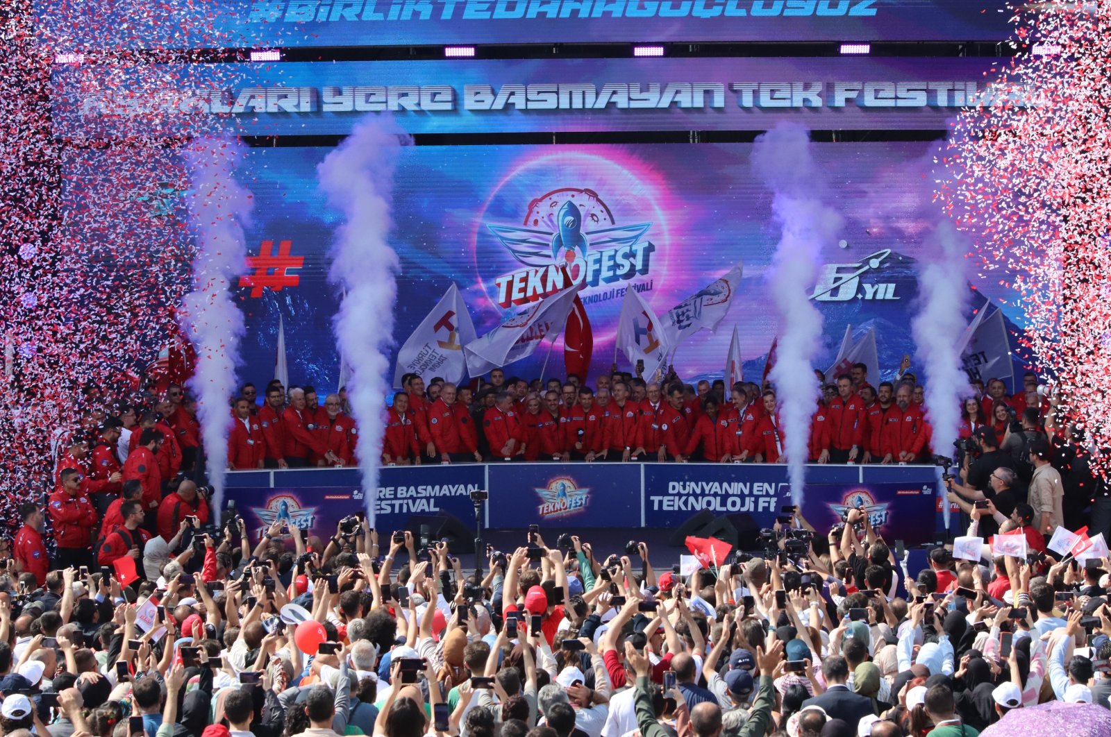 A crowd of visitors is seen as officials open the newest edition of Türkiye's largest tech fair, Teknofest, held at Çığlı Airport in western Izmir province, Türkiye, Sept. 27, 2023. (IHA Photo)