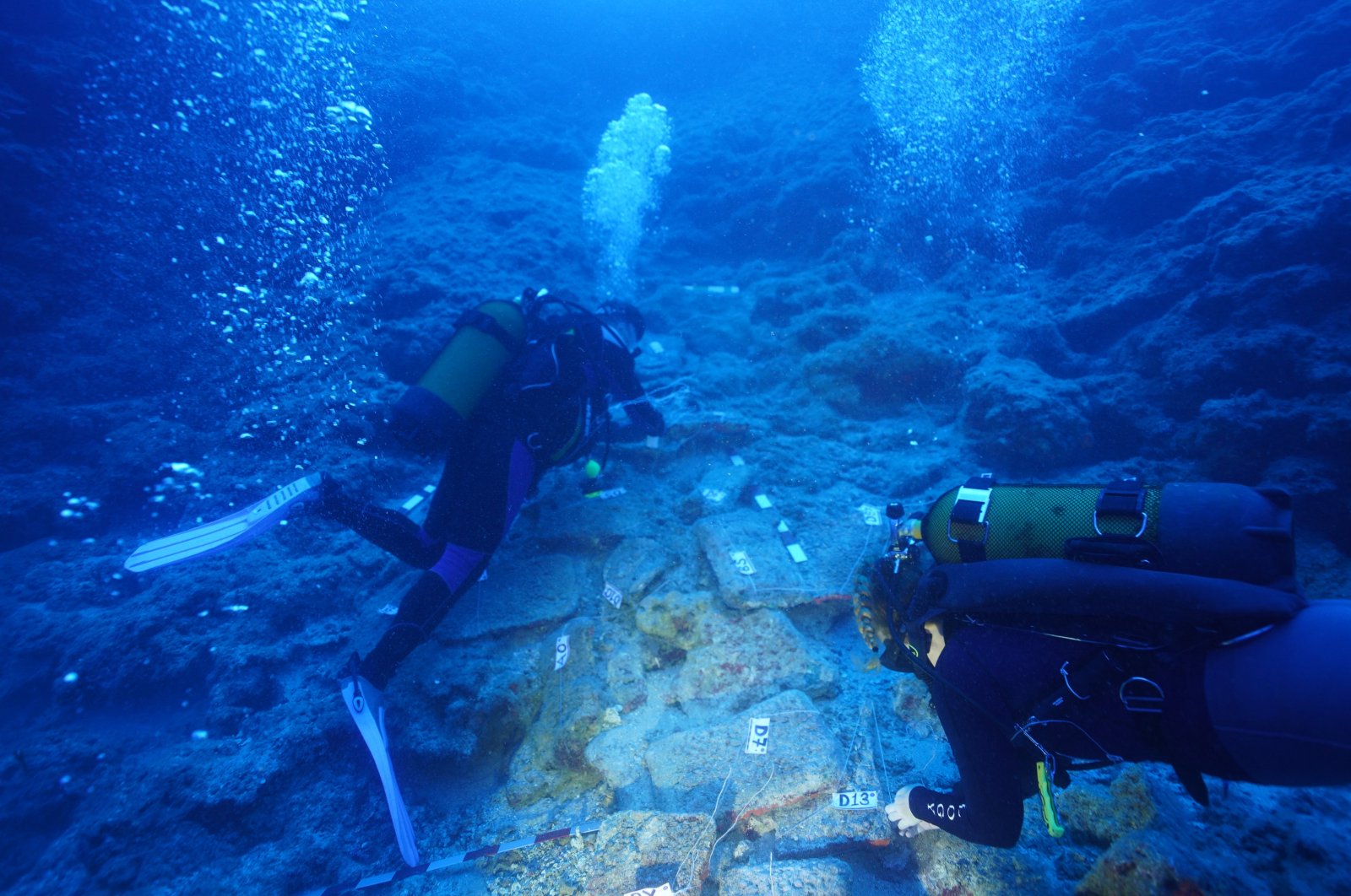 Divers are photographed along Kumluca Middle Bronze Age shipwreck, dubbed as one of the "oldest known shipwrecks," Antalya, southern Türkiye, Oct. 6, 2023. (AA Photo)
