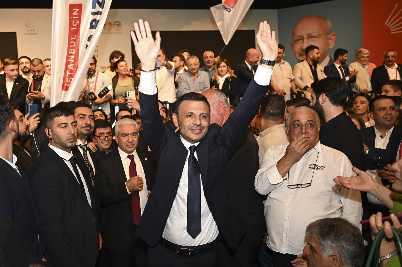 Özgür Çelik greets the crowd after being elected chair of the Republican People's Party's (CHP) Istanbul office at intraparty voting in Istanbul, Türkiye, Oct. 8, 2023. (AA Photo)
