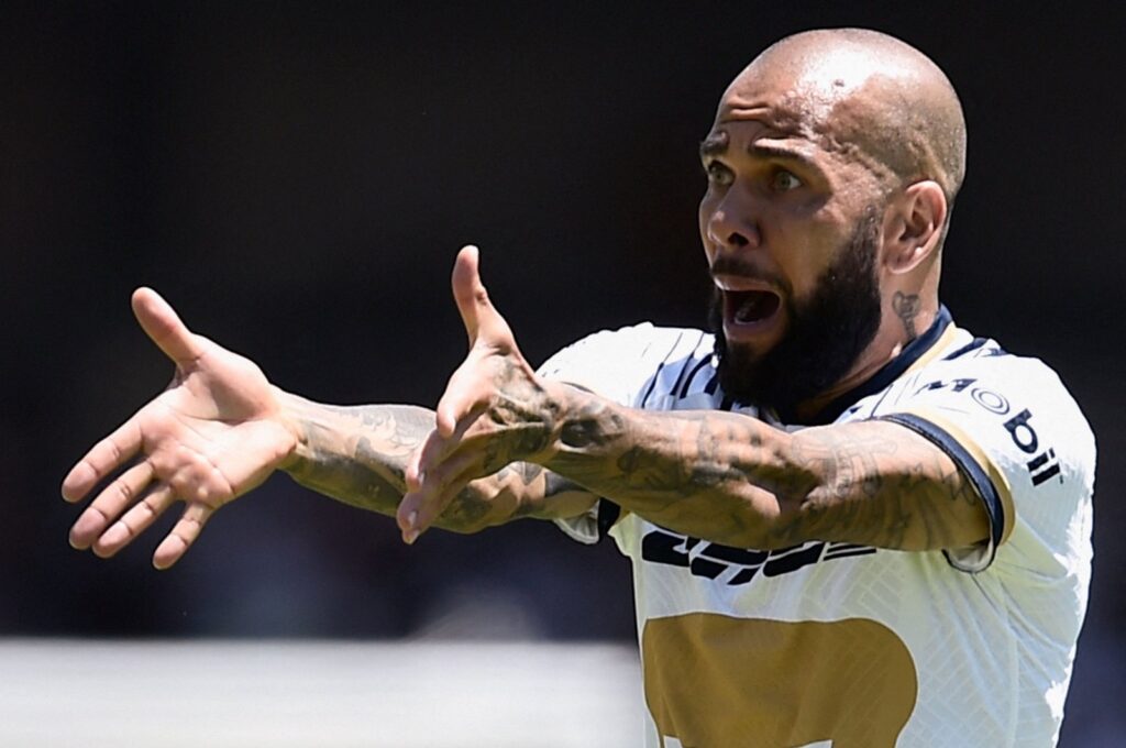 Ex-Pumas' Brazilian Dani Alves gestures during their Mexican Apertura 2022 tournament football match against Monterrey at the University Olympic stadium, Mexico City, Mexico, July 31, 2022. (AFP Photo)