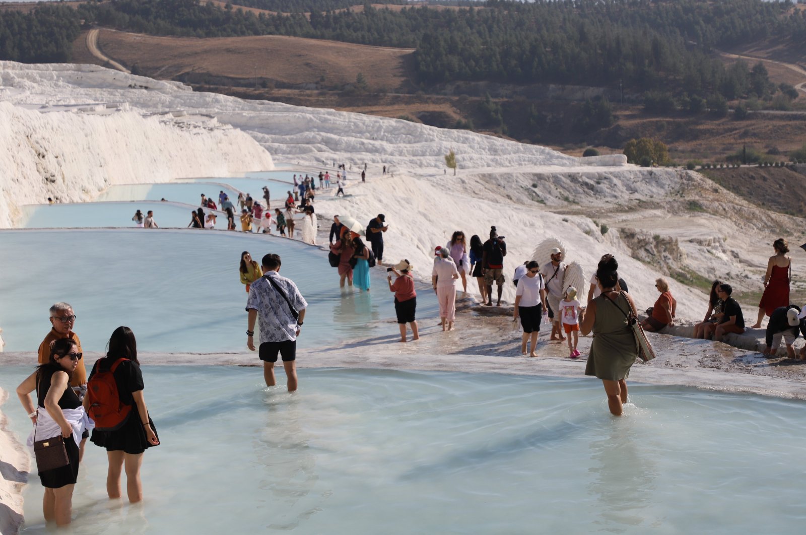 Tourists are seen in Pamukkale, Denizli province, western Türkiye, Nov. 8, 2023. (AA Photo)