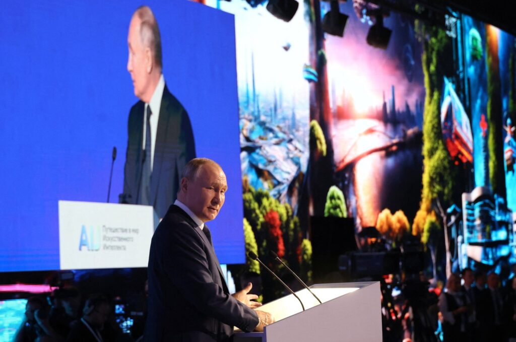 Russian President Vladimir Putin delivers a speech during a plenary session of the Artificial Intelligence Journey 2023 international AI and machine learning conference in Moscow, Russia Nov. 24, 2023. (Sputnik/Mikhail Klimentyev/Kremlin via Reuters)