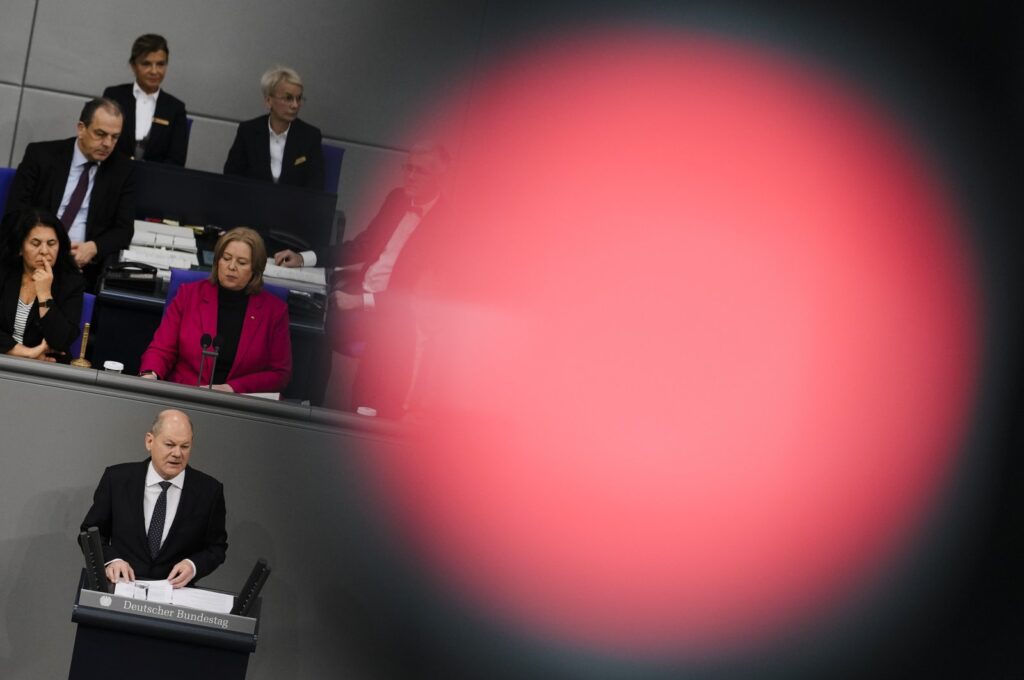 German Chancellor Olaf Scholz (C) delivers a speech about Germany's budget crisis at the parliament Bundestag in Berlin, Germany, Nov. 28, 2023. (AP Photo9
