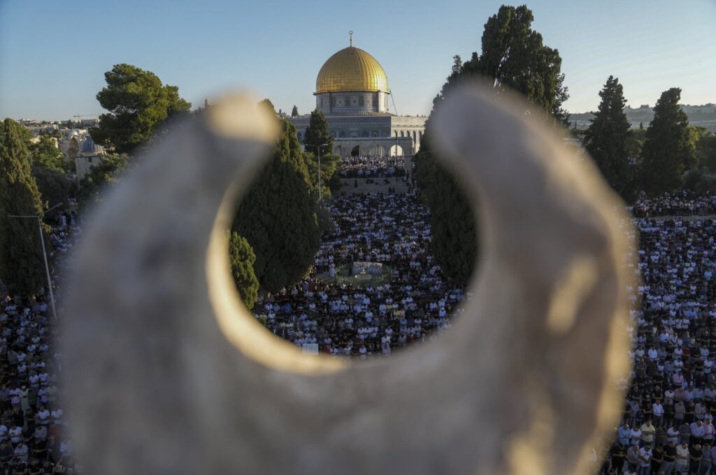 Muslim worshipers offer Eid al-Adha prayers next to the Dome of the Rock shrine at the Al-Aqsa Mosque compound in occupied East Jerusalem's Old City, Palestine, June 28, 2023. (AP Photo)