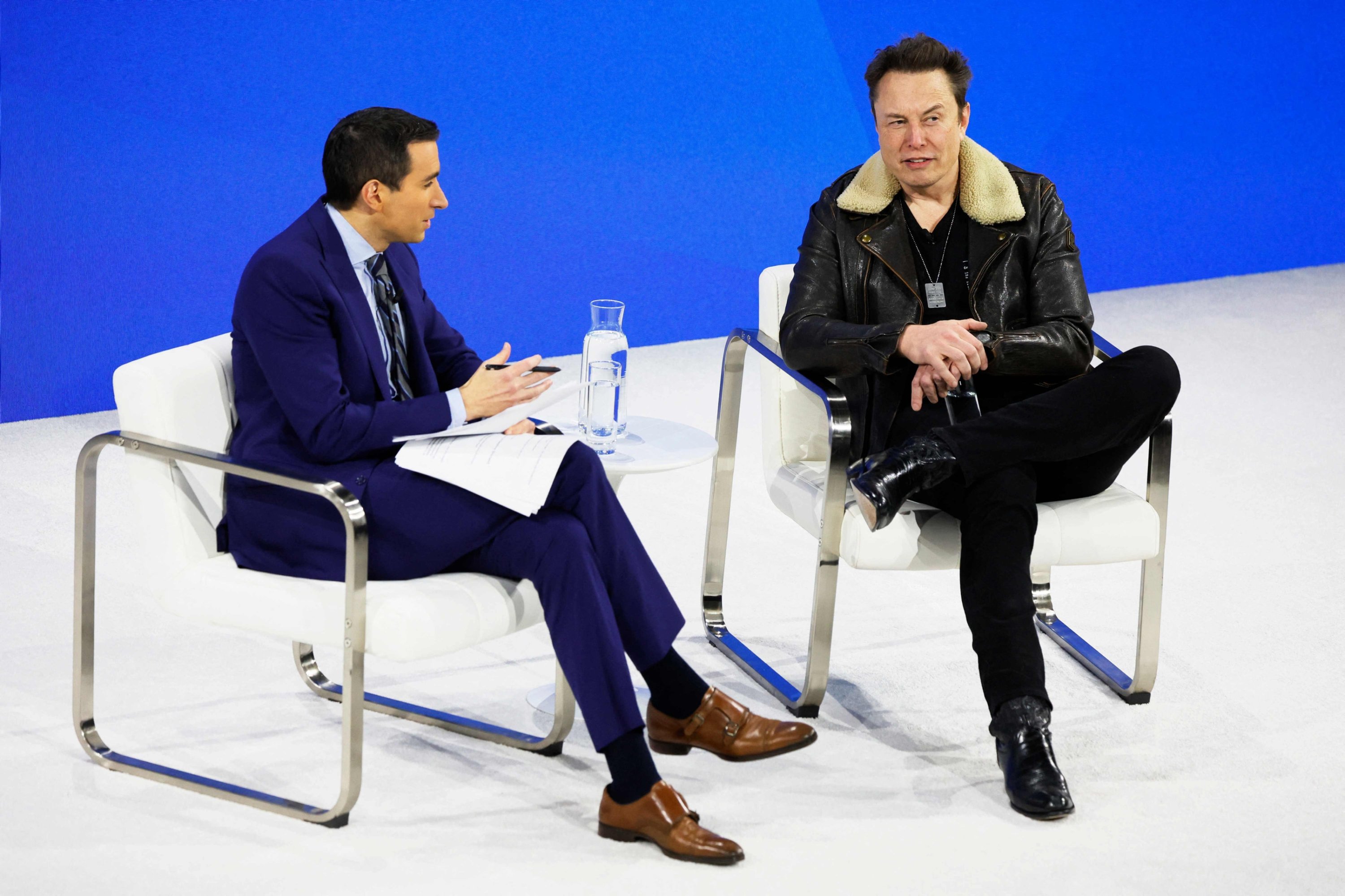 303534 NYT Columnist Andrew Ross Sorkin (L) and C.E.O. of Tesla, Chief Engineer of SpaceX, and C.T.O. of X platform Elon Musk speak during the New York Times annual DealBook summit, New York, U.S., Nov. 29, 2023. (AFP Photo)