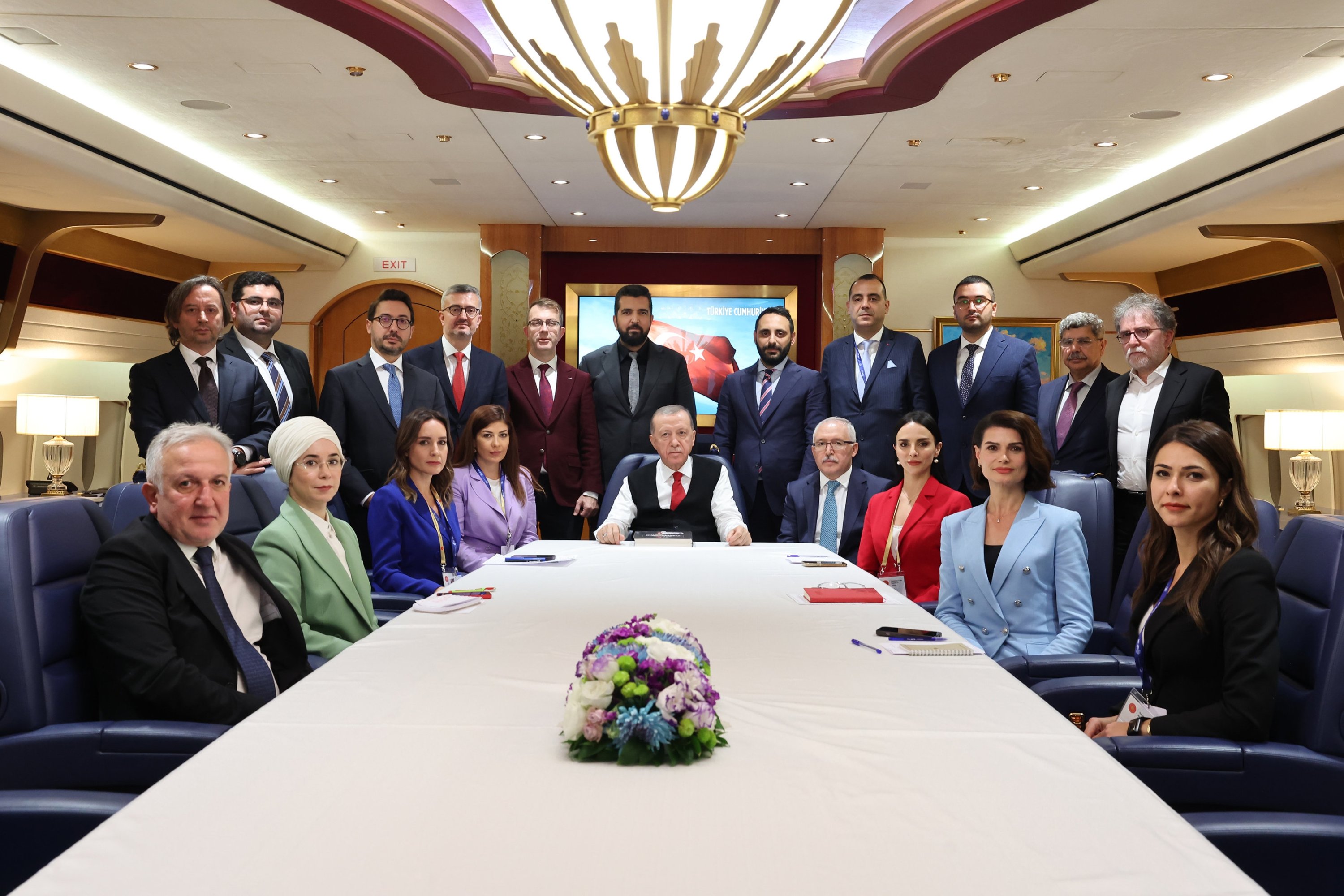 303720 President Recep Tayyip Erdoğan (C) returns on a flight from Dubai accompanied by journalists, among them Daily Sabah Editor-in-Chief Ibrahim Altay (C-L), Dec. 1, 2023 (AA Photo)