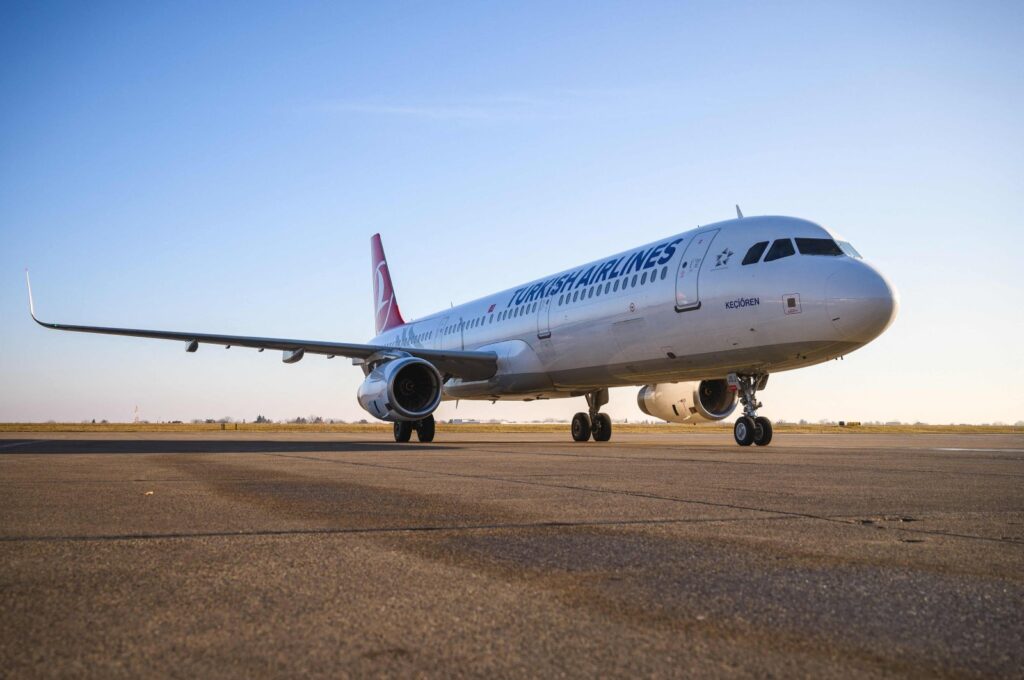 A Turkish Airlines Airbus A321 passenger plane rolls along the tarmac at Belgrade's airport, Serbia, Feb. 21, 2021. (AFP Photo)