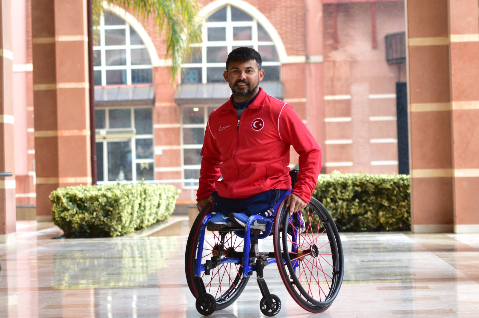 Turkish wheelchair tennis national team player Uğur Altınel poses for a photo after an interview, Antalya, Türkiye, Nov. 29, 2023. (AA Photo)