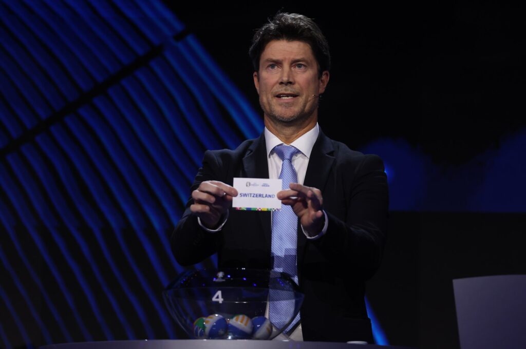 Special guest Brian Laudrup pulls out the card of Switzerland during the UEFA EURO 2024 Final Tournament Draw at Elbphilharmonie, Hamburg, Germany, Dec. 2, 2023. (Getty Images Photo)