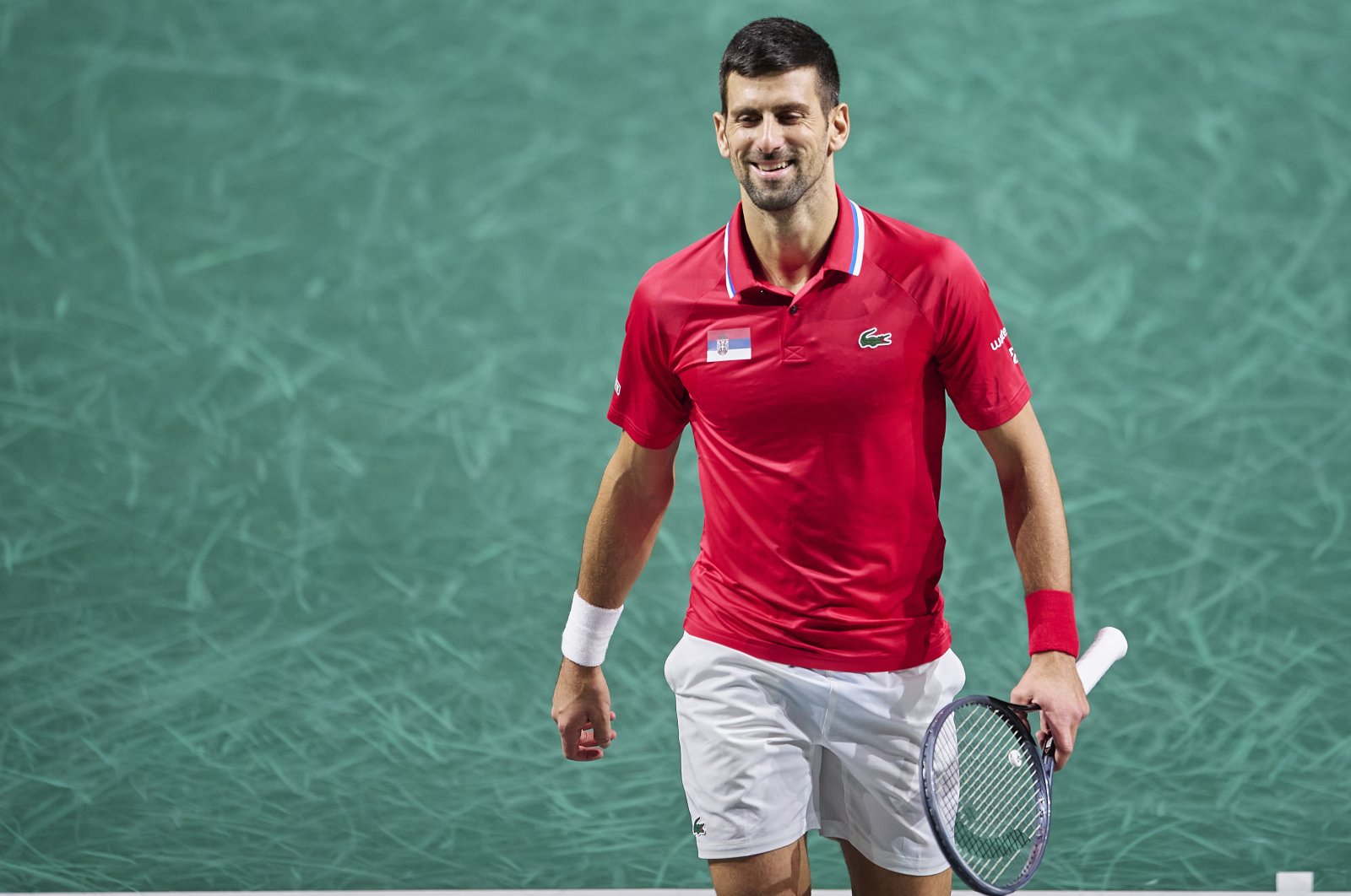 Serbia's Novak Djokovic looks on during the semifinal match against Jannik Sinner and Lorenzo Sonego of Italy in Davis Cup Final at Palacio de Deportes Jose Maria Martin Carpena, Malaga, Spain, Nov. 25, 2023. (Getty Images Photo)