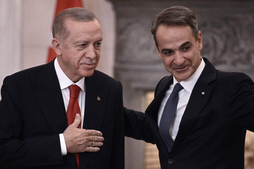 President Recep Tayyip Erdoğan (L) and Greek Prime Minister Kyriakos Mitsotakis leave after speaking to the press following their meeting in Athens during Erdogan's official visit to Greece, Dec. 7, 2023. (AFP Photo)