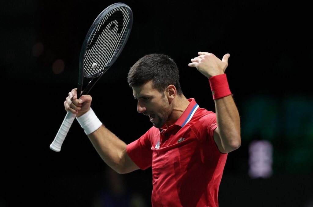 Serbia's Novak Djokovic reacts during the men's doubles semifinal tennis match between Italy and Serbia in the Davis Cup, Martin Carpena sports hall, Malaga, Spain, Nov. 25, 2023. (AFP Photo)