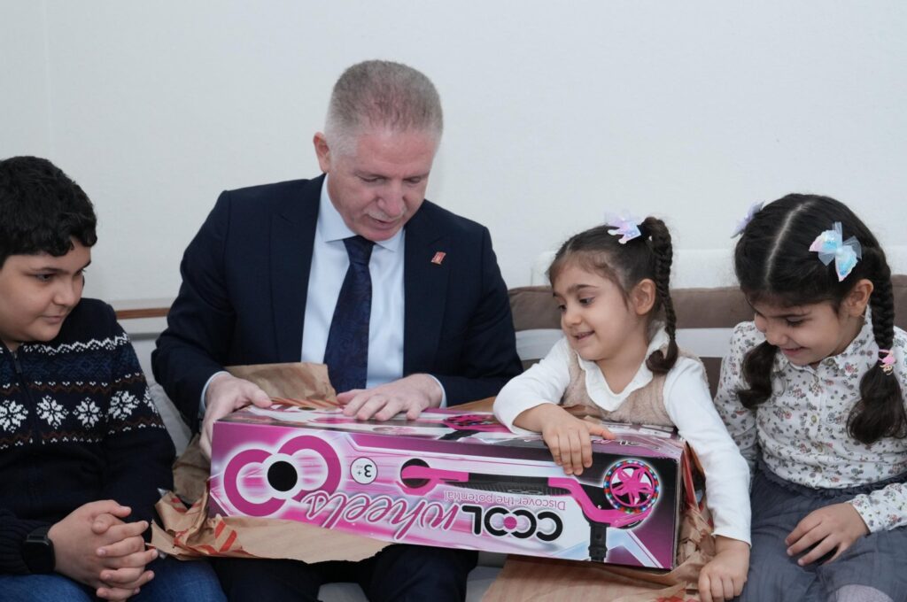 Istanbul Governor Davut Gül visits children with gifts they wished for, at their home, Istanbul, Türkiye, Dec. 12, 2023. (AA Photo)