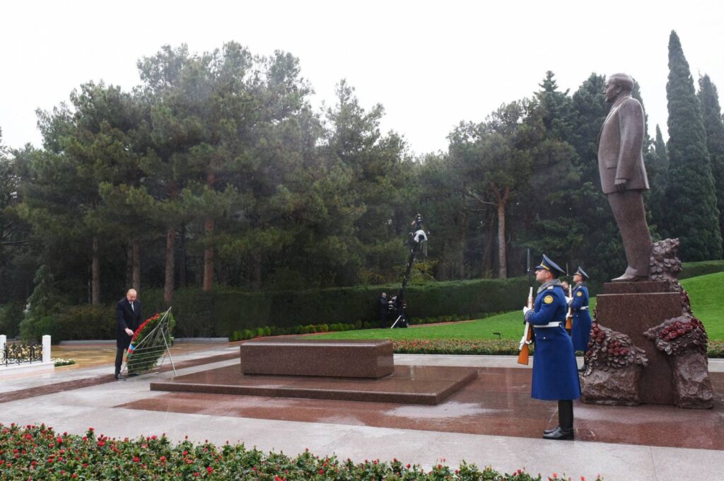 President Ilham Aliyev leaves a wreath at the grave of his father Heydar Aliyev, in Baku, Azerbaijan, Dec. 12, 2023. (AA Photo)