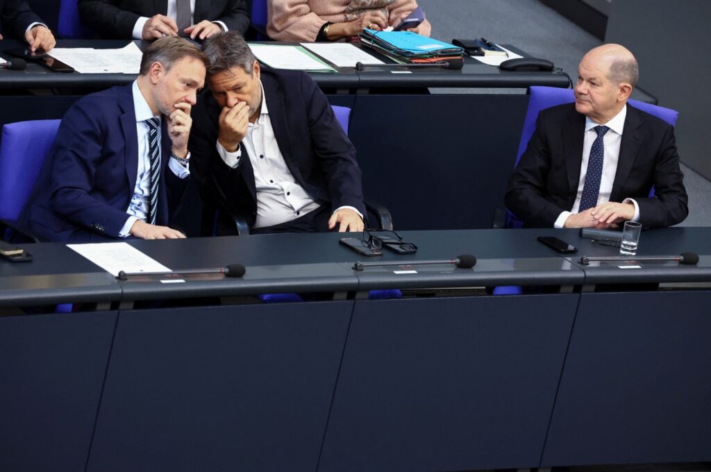 German Chancellor Olaf Scholz looks on as German Finance Minister Christian Lindner speaks with German Economy and Climate Minister Robert Habeck on the day of delivering a government declaration on the budget situation to the Bundestag, Berlin, Germany, Nov. 28, 2023. (Reuters Photo)