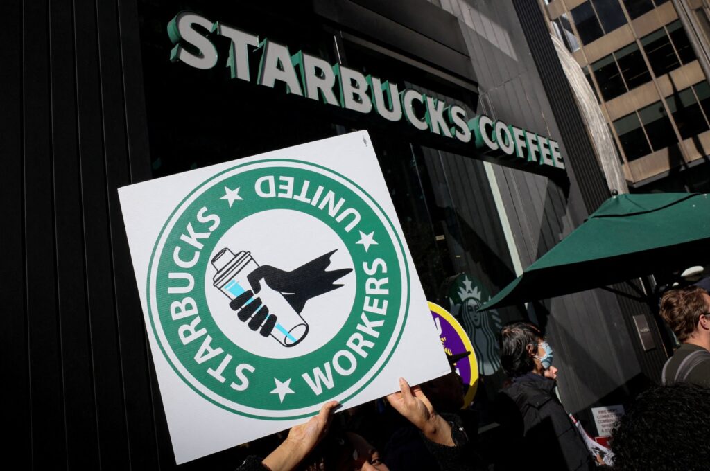 Members of the Starbucks Workers Union and other labor organizations picket and hold a rally outside a company-owned Starbucks store, New York City, U.S., Nov. 16, 2023. (Reuters Photo)