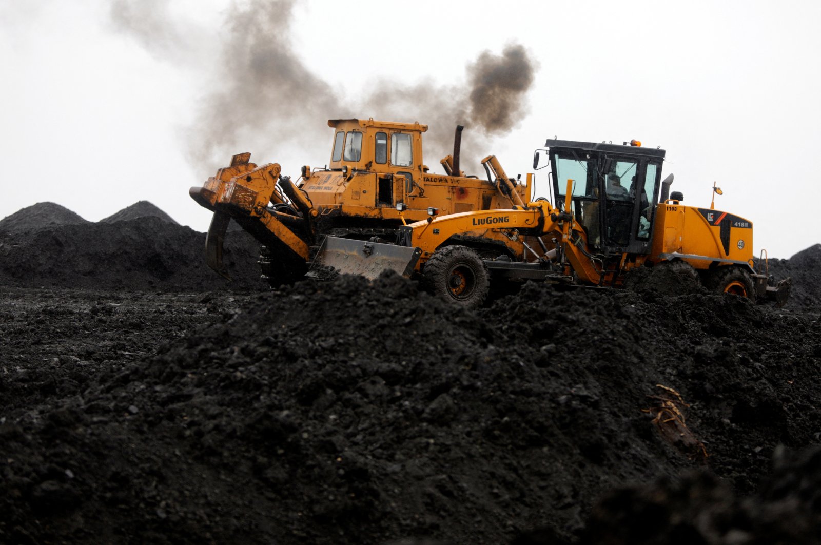 Excavators push coal near the largest domestic electricity production facility REK Bitola, in Bitola, North Macedonia, Nov. 28, 2023. (Reuters Photo)