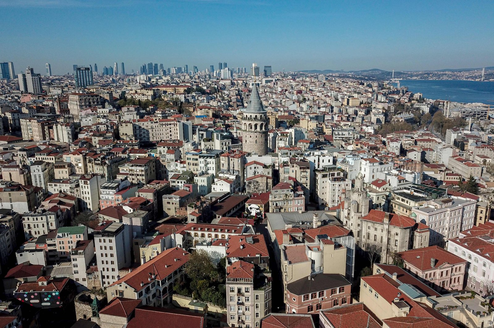 The iconic Galata Tower and residential buildings are seen in Istanbul, Türkiye, April 18, 2020. (AFP Photo)