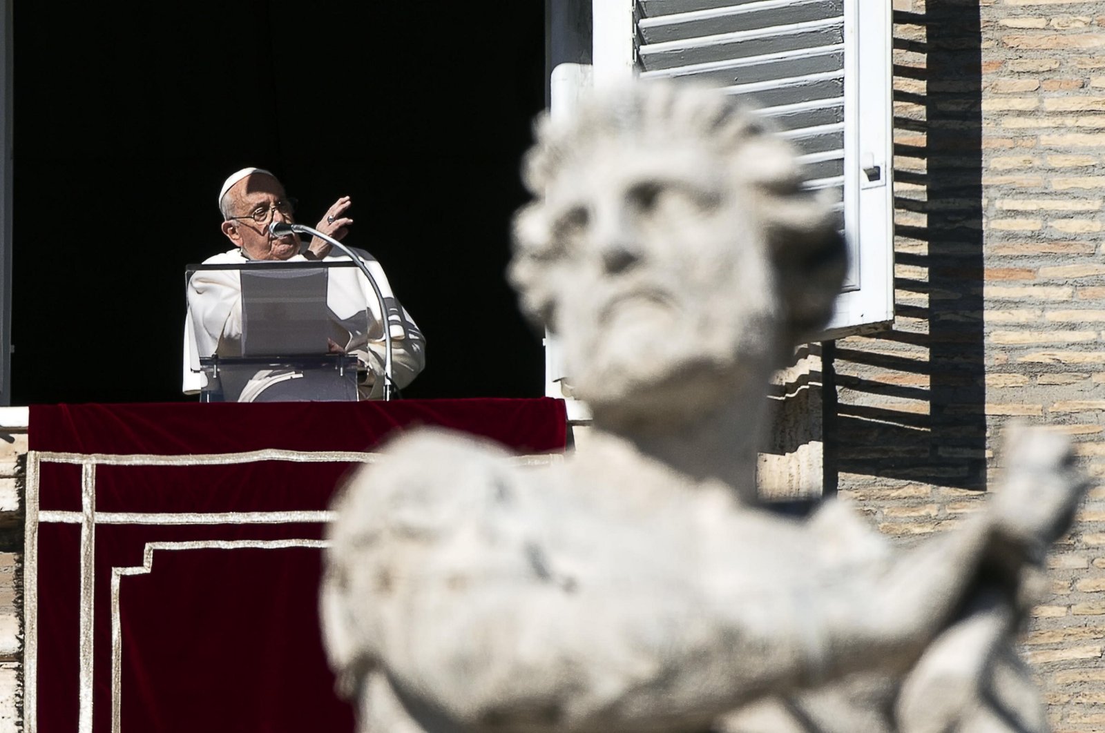 Pope Francis addresses the crowd from the window of the apostolic palace overlooking St. Peter's Square, Vatican City, Dec. 17, 2023. (EPA Photo)
