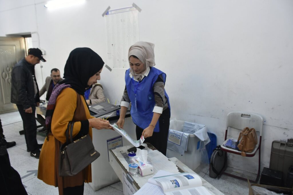 People cast their vote at a polling station, in Kirkuk, Iraq, Dec. 18, 2023. (AA Photo)