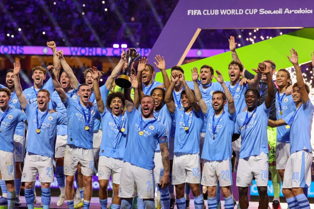 Manchester City players celebrate with their winning trophy at the end of the FIFA Club World Cup 2023 football final match against Brazil's Fluminense at King Abdullah Sports City Stadium, Jeddah, Saudi Arabia, Dec. 22, 2023. (AFP Photo)