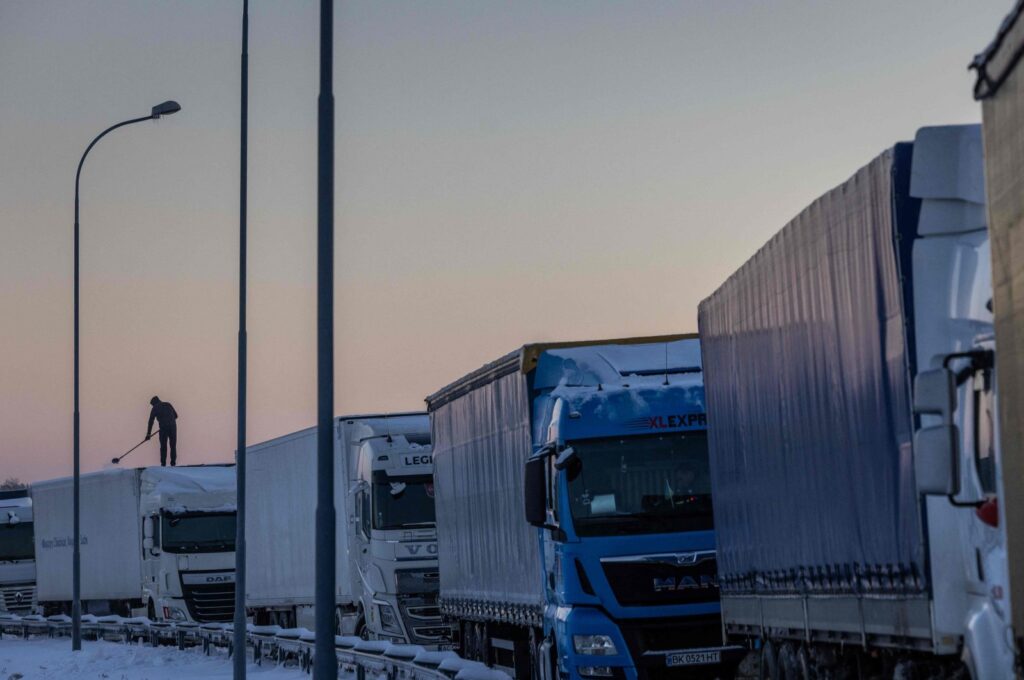 Trucks belonging to different Polish transport companies block access to the Polish-Ukraine border crossing in protest against "unfair" competition in Hrebenne, Poland, Dec. 4, 2023. (AFP Photo)