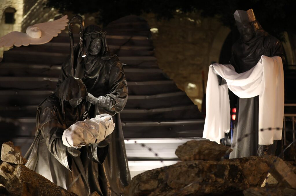 A Christmas installation scene surrounded by rubble and wires next to the Church of the Nativity in solidarity with the people of Gaza, Bethlehem, occupied West Bank, Palestine, Dec. 23, 2023. (EPA Photo)