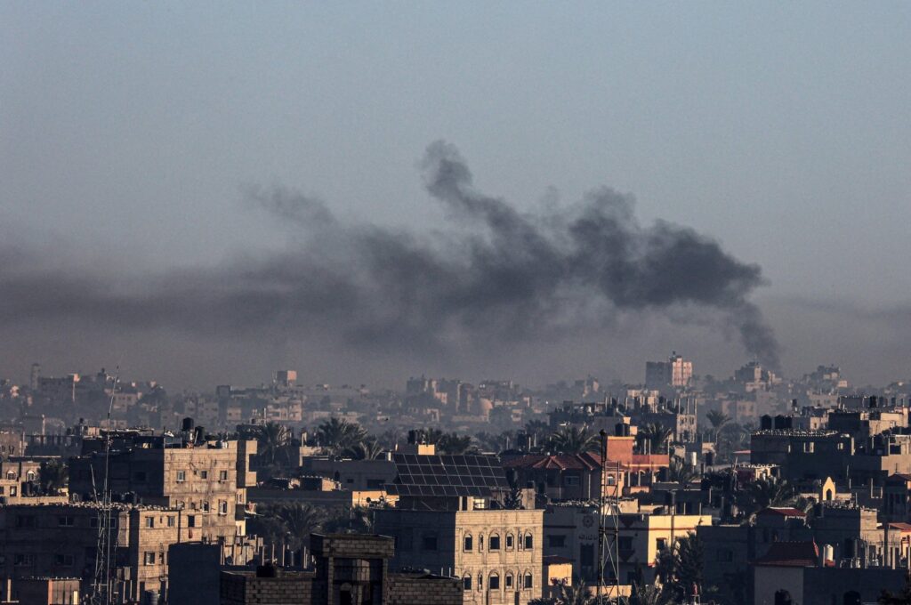 A picture taken from Rafah shows smoke billowing over Khan Younis in the southern Gaza Strip, Palestine, Dec. 26, 2023. (AFP Photo)