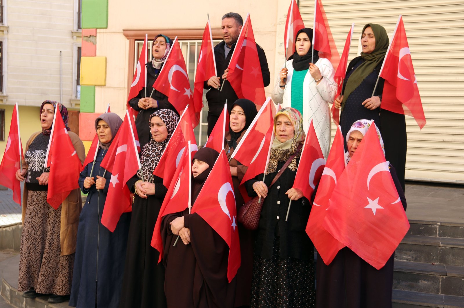 Families are seen protesting the PKK in front of the Peoples' Democratic Party (HDP) headquarters in southeastern Diyarbakır province, Türkiye, Dec.25, 2023. (AA Photo)