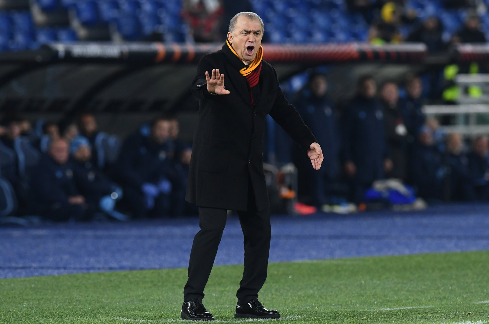 Former Galatasaray coach Fatih Terim gestures during the Lazio-Galatasaray match at the Stadio Olimpico, Rome, Italy, Dec. 9, 2021. (Getty Images Photo)