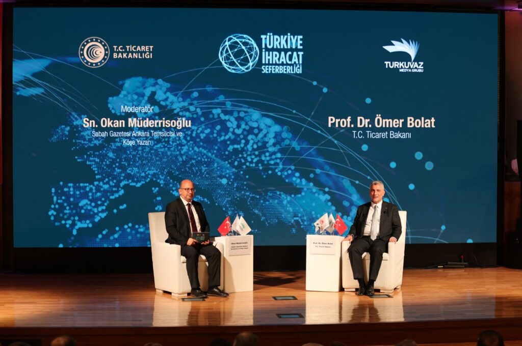Trade Minister Ömer Bolat (R) speaks during the Türkiye Export Mobilization Summit, organized by Turkuvaz Media Group, in Gaziantep, southeastern Türkiye, Dec. 26, 2023. (AA Photo)