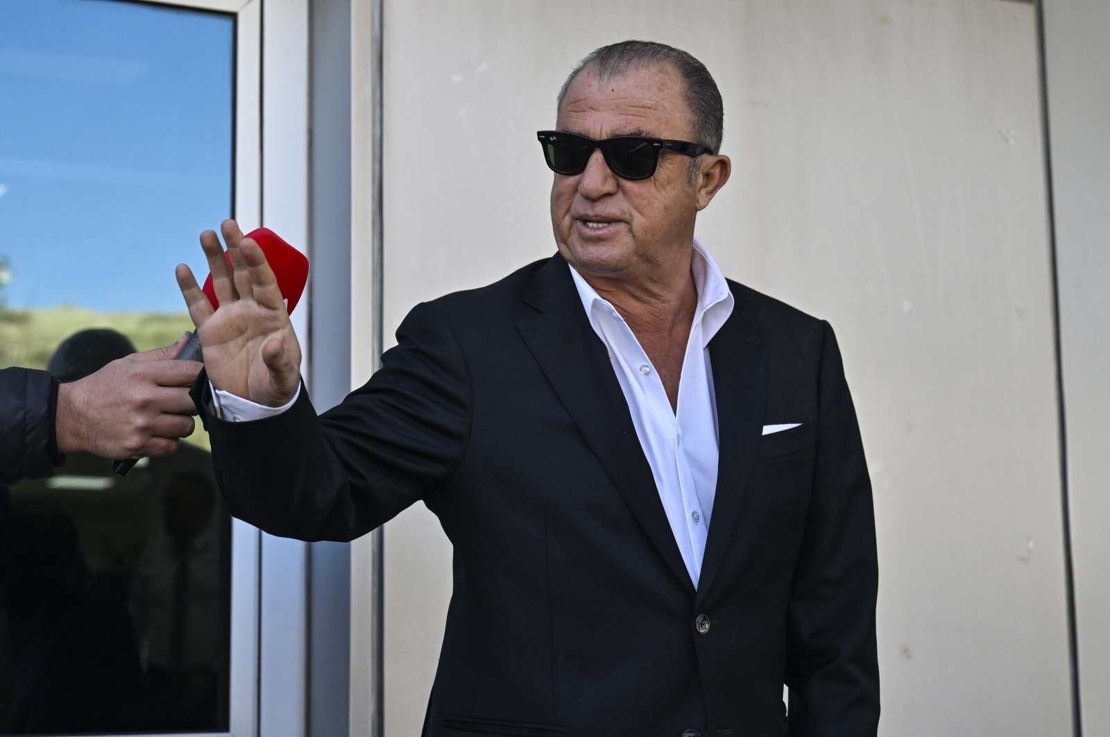 Panathinaikos new coach Fatih Terim speaks to the press ahead of his departure to Greece, Istanbul, Türkiye, Dec. 26, 2023. (AA Photo)
