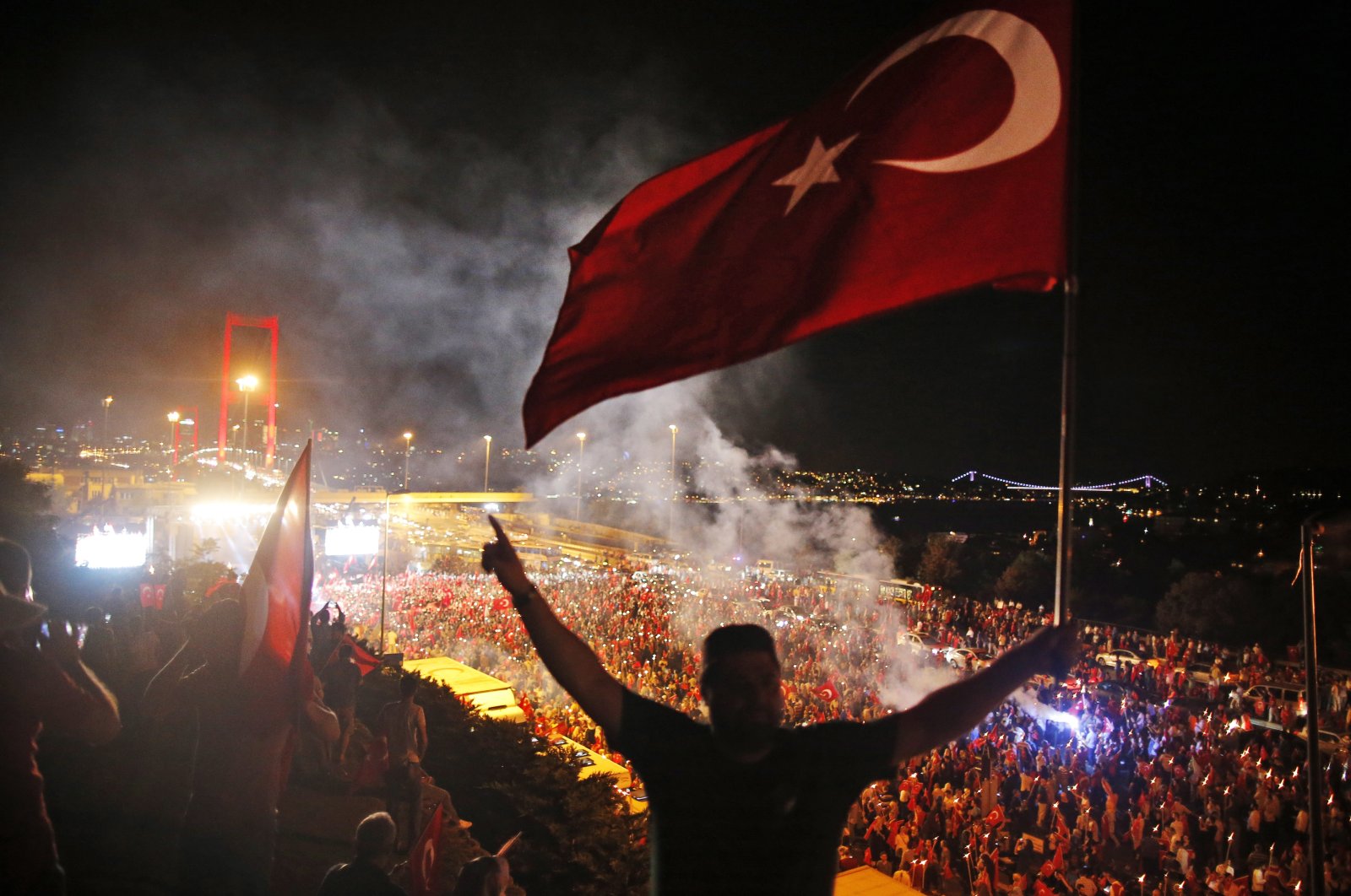 People celebrate victory over FETÖ's coup attempt, in Istanbul, Türkiye, July 21, 2016. (AP Photo)